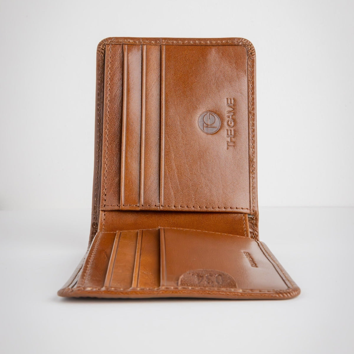 Brown leather wallet with brand logo on a light gray background